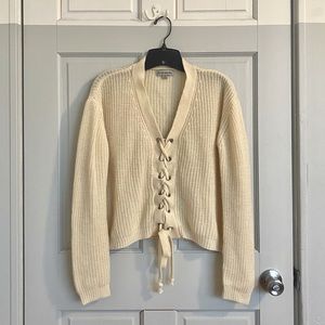 Vintage 90’s cream/ivory slouchy knit sweater with lace-up v-neck detail